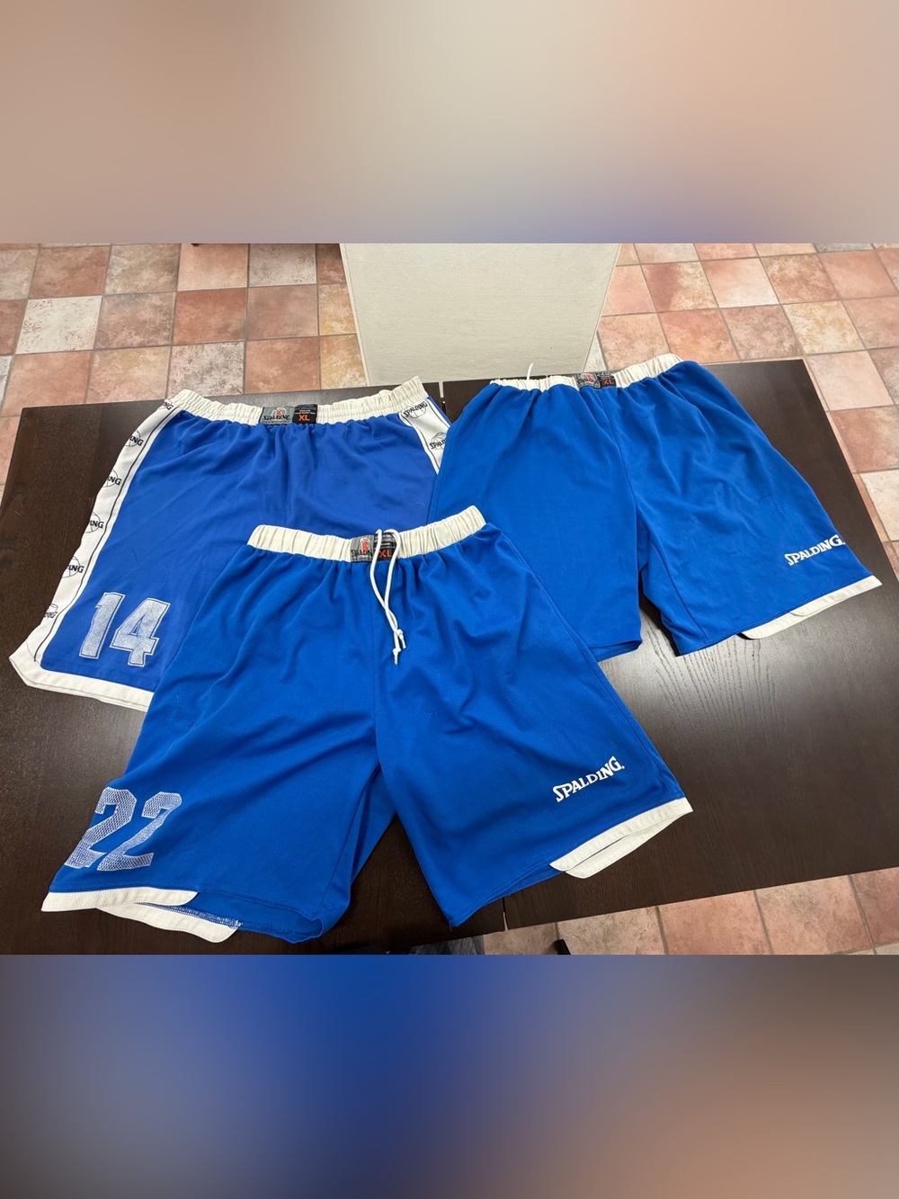 Three pair of size extra large basketball shorts